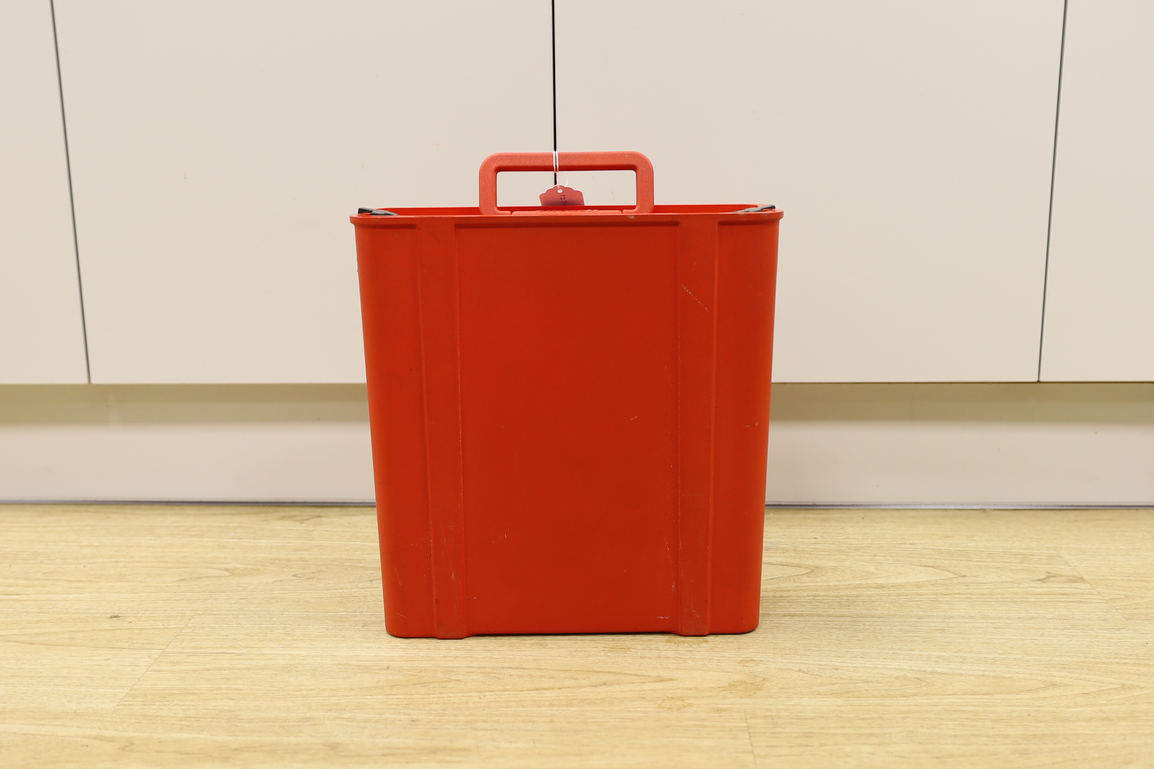An Olivetti Valentine typewriter in red plastic case